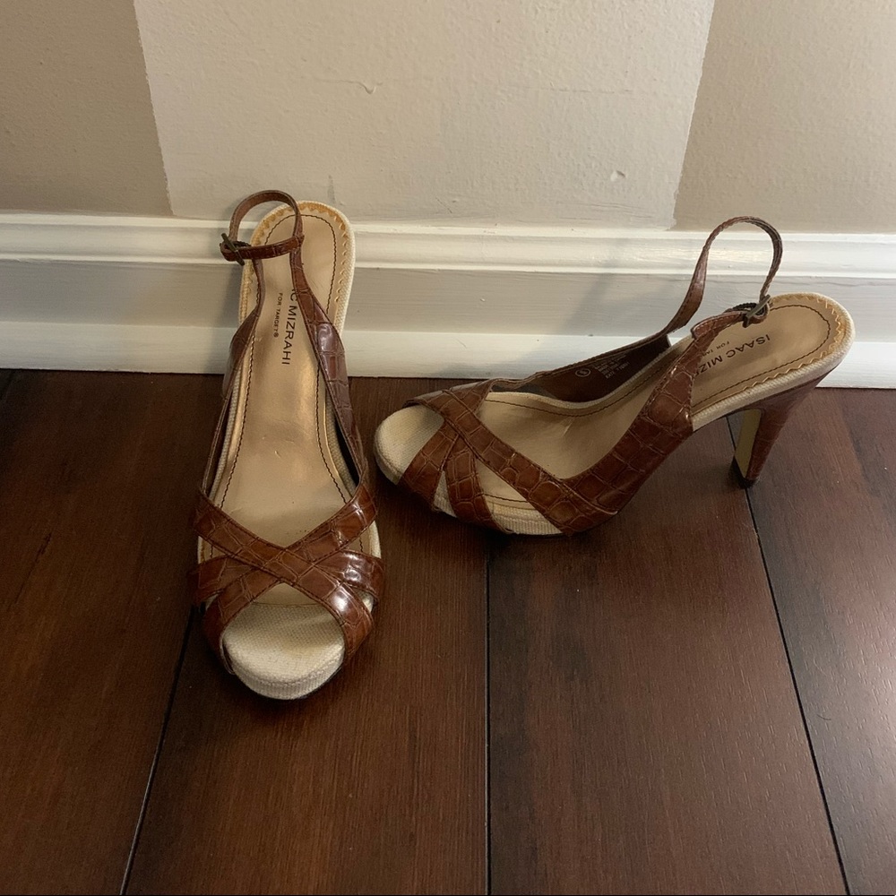 Brown and neutral peep toe sandals.